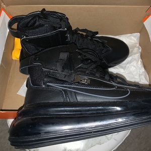 Black Nike high top sneakers